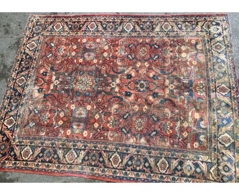 Antique Mahal carpet with an all-over stylised floral design on a brick red ground with borders, 11ft 8ins x 9ft approximatel
