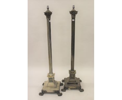 Pair of fine quality 20th Century plated on brass Corinthian column lamp standards, the square stepped bases above cast paw f