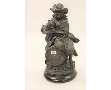 Late 19th Century dark patinated spelter figure of a seated boy on a barrel, playing bagpipes (at fault) together with a bras