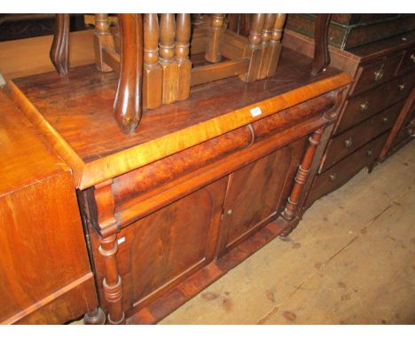 Victorian mahogany chiffonier, the deep moulded top above a concealed drawer, two arched panel doors flanked by turned pilast