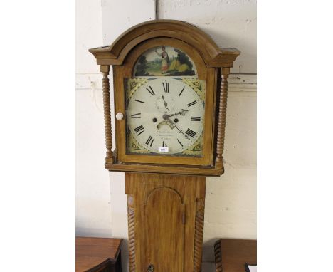 19th Century stained pine longcase clock, the broken arch hood with bobbin pilasters above a shaped panelled door and conform