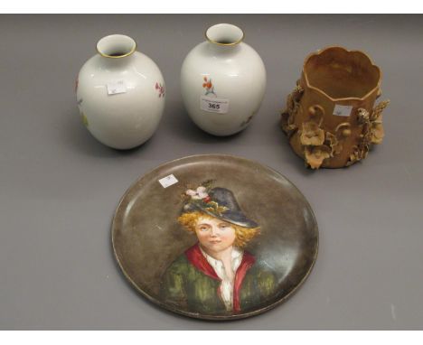 Pair of modern Meissen baluster form vases painted with flowers, a Continental pottery plate painted with a portrait and a St