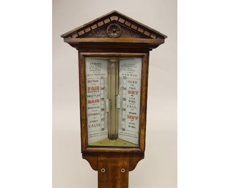 Victorian oak stick barometer, the dial inscribed Spikins from  Dent, London, 42ins high 