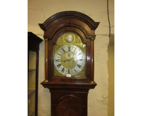 Figured walnut longcase clock, the broken arch hood with flanking pilasters above a moulded panel door and conforming plinth 