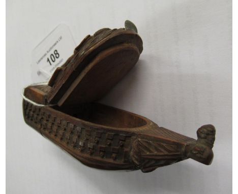 18th Century carved coquilla nut snuff box in the form of a man o' war, 4.5ins wide 