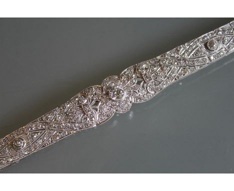 Fine Art Deco platinum and diamond set articulated bracelet, 30g, 178mm in length 