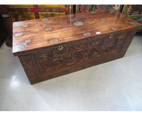 Late 19th or early 20th Century Indian padouk and brass inlaid coffer, the hinged lid decorated with various oval motifs, the