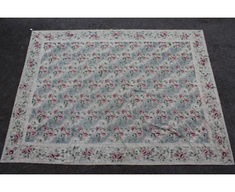 Indian Numdah carpet worked with an all-over stylised floral design, 103in x 139in 