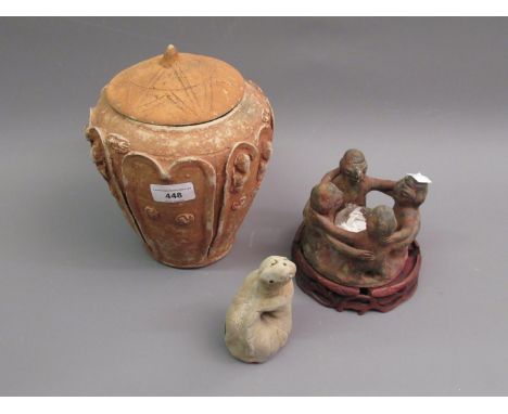 Pre-Columbian style figural candlestick together with a pottery vase and cover, 8ins high and a pottery figure of a snake, in