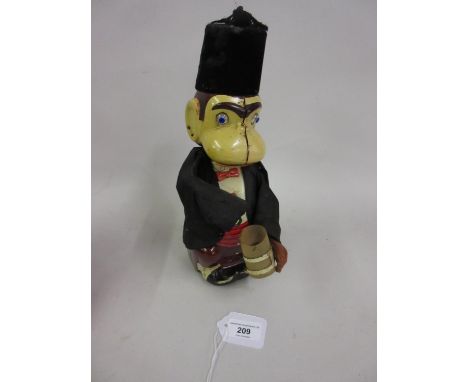 Mid 20th Century Japanese Line Mar Toys battery operated tin plate figure of a drinking monkey, 12ins high 