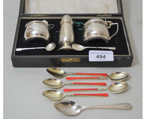 Cased three piece silver condiment set, five silver red enamel coffee spoons and a single silver coffee spoonCondiment set in