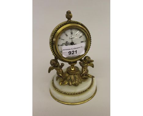 Small gilt brass Halcyon Days mantel clock, having Swiss movement with circular dial and Roman numerals, inscribed ' Seven Je