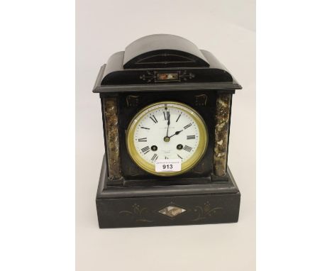 Small 19th Century French black slate and marble mounted two train mantel clock with enamel dial, Roman numerals, signed J. B