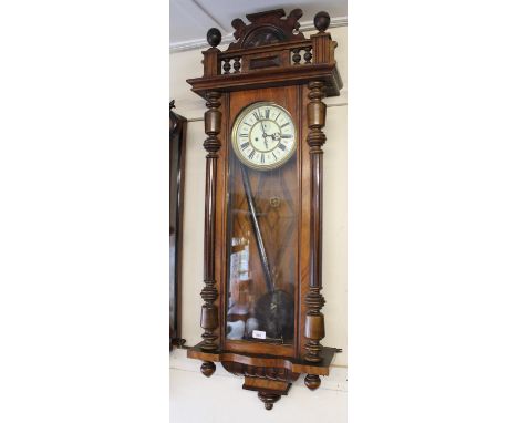 19th Century walnut Vienna wall clock, the ceramic dial with Roman numerals and subsidiary seconds by Gustav Becker, with a t