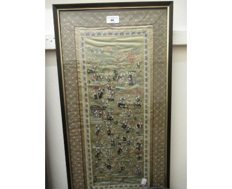 Chinese silk embroidered sleeve panel depicting figures in a landscape, 25.5ins x 12.5ins, framed 