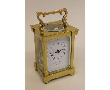 Matthew Norman of London, brass cased carriage clock, the dial with Roman numerals, 5ins high x 3.5ins wide x 3ins deep, with