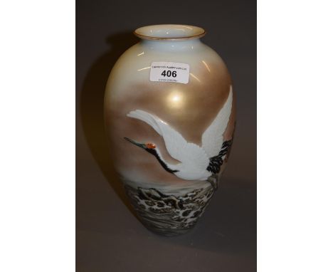 Japanese porcelain baluster form vase relief moulded with a bird in landscape, signed with character marks to base, 9.5ins hi