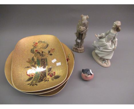 Small Royal Copenhagen figure of a bird, Lladro figure of a girl (at fault), carved soapstone figure and three Rosenthal 'Bjo