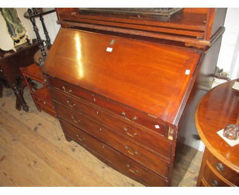 George III mahogany bureau, the fall front enclosing a fitted interior above four graduated drawers with brass swan neck hand
