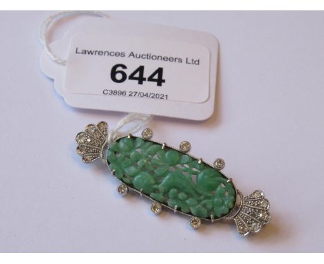 Art Deco oval carved jade and diamond set brooch, 7.8g, 51mm wide 