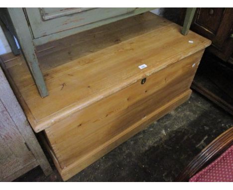 19th Century pitch pine trunk with hinged lid, 38ins wide approximately 
