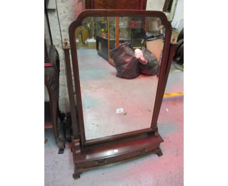 Edwardian mahogany swing frame toilet mirror, the shaped bevelled plate above a bow front base with single drawer, on ogee br