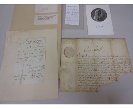 The upper portion of a document signed Charles R. (Charles II), ordering garter robes for the Duke of Northumberland, undated