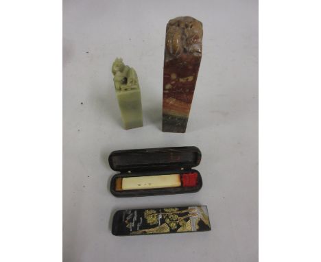 Chinese seal housed in a horn case together with two soapstone seals and an ink stick 