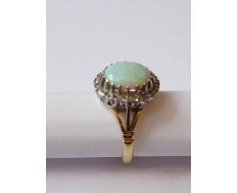 18ct Yellow gold oval opal and diamond cluster ring, 5.4g 