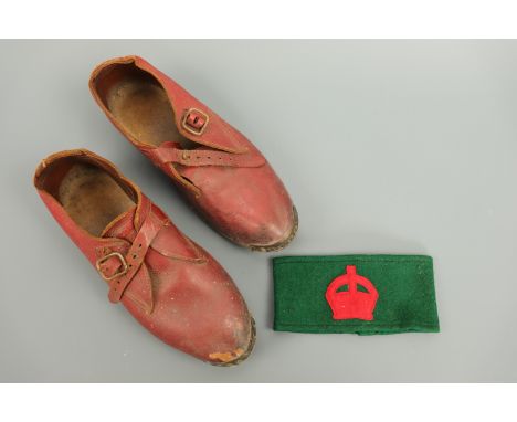 A Women's Land Army armband and a pair of clogs