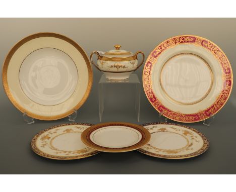 A collection of Minton gilded plates, including two H3775 Dynasty pattern dessert plates, a K159 Buckingham pattern dinner pl