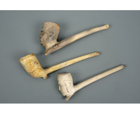A Victorian 12th Lancers clay pipe, with two others the bowls of which depict busts of Generals Gordon and Redvers Buller res