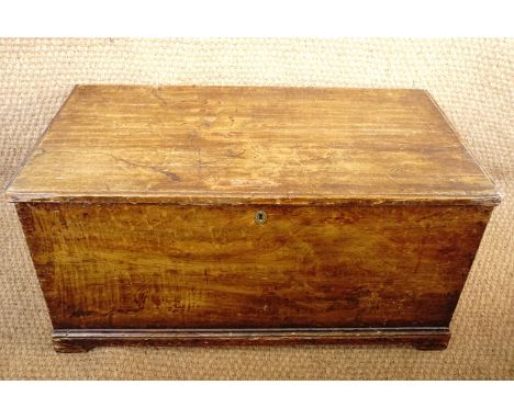 A 19th Century scumbled pine trunk, 105 × 57 × 52 cm