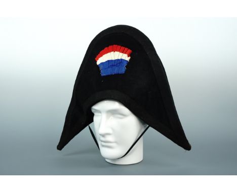 A vintage child's vintage fancy-dress bicorne hat