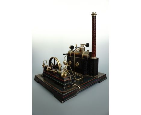 A Doll horizontal live steam engine with boiler feed pump, boxed, circa 1920