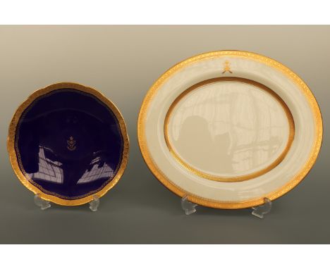 A Royal Worcester serving dish bearing the armorial of the Sultan of Oman, together with a Minton dish of cobalt blue and gil