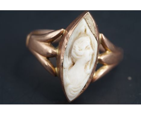 A Georgian finger ring set with a navette antique carved ivory relief profile of a woman, likely a Grand Tour archeological r