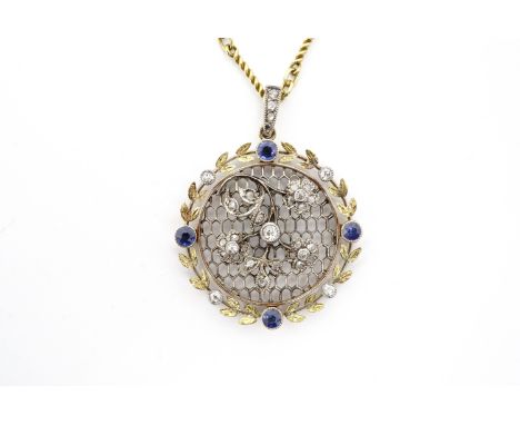 A Belle Epoque sapphire and diamond sentimental pendant, having a central forget-me-not sprig, symbolising "remember me" / "t