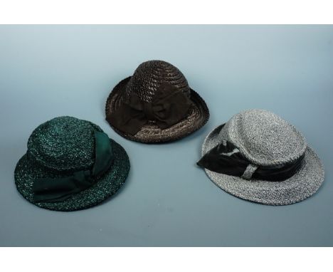 Three vintage straw hats, each embellished with a ribbon, second quarter 20th Century