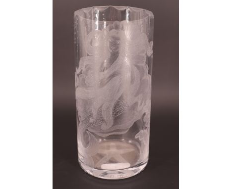 An antique intaglio etched glass vase, of cylindrical form, decorated with a recumbent mermaid surrounded by fish, sea snail,