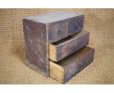 A 19th Century office or workshop pine chest of drawers with brass ring handles, 40 cm x 22 cm x 36 cm