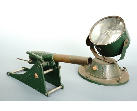 An Astra toy heavy Howitzer and Super Search Light, 26 x 11 cm and 19 cm high respectively