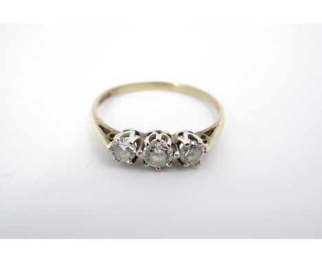 A three stone diamond ring on 9ct gold, each brilliant-cut diamond of approximately .25ct, cathedral and chenier set, 1.4 g