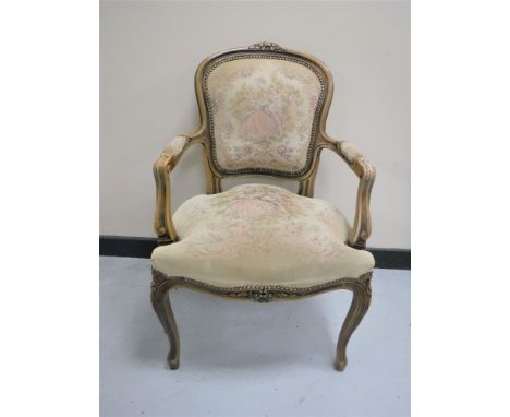 A French style armchair upholstered in a tapestry fabric