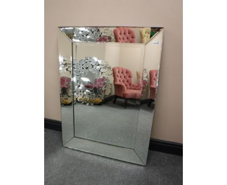 A glass framed mirror 