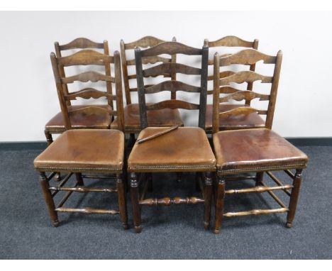 A set of six ladder back country kitchen chairs