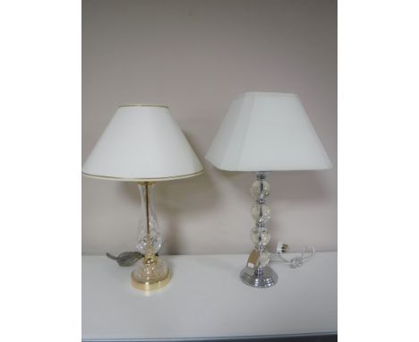 A lead crystal table lamp with shade together with a contemporary table lamp