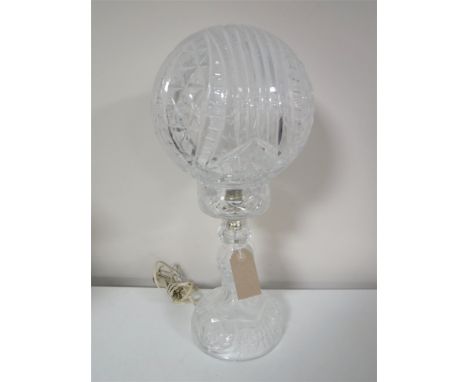 A cut glass table lamp with shade, height 44cm CONDITION REPORT: Good condition. Untested. Post 1950's.