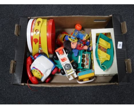 A box of vintage children's toys