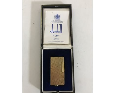 A boxed Dunhill lighter